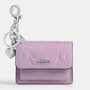 💜🔹️Coach 🔹️Klare Bag Charm in Light Violet Signature Leather w/ Heart Charm